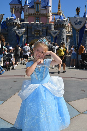 Girl in front of Disneyland Magic Castle