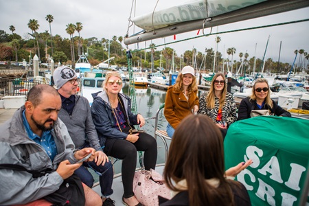 Jouranlists aboard the Sunset Kidd sailing yacht in Santa Barbara