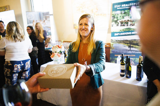 Healdsburg Tourism Improvement District hands out sampler boxes of local favorites to Visit California staff 
