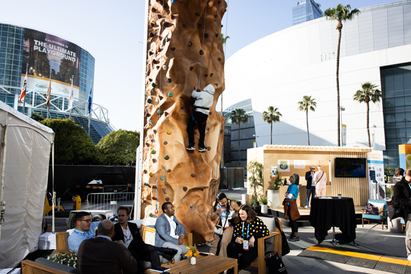 Rockclimbing wall at the Beyond the Gateways lounge at IPW Los Angeles 2024